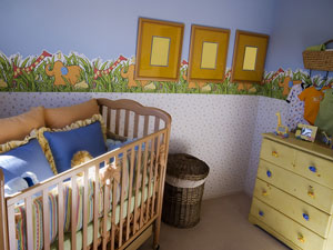 baby nursery with crib and dresser